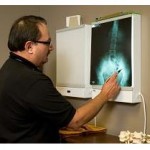 Dr Maxwell Assessing X-rays Prior To Chiropractic Care